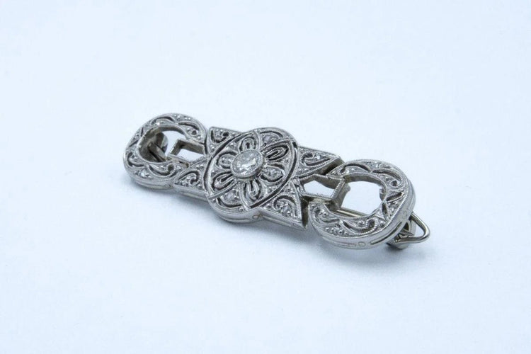 Broche Broche Art déco en platine et diamants 58 Facettes 10583