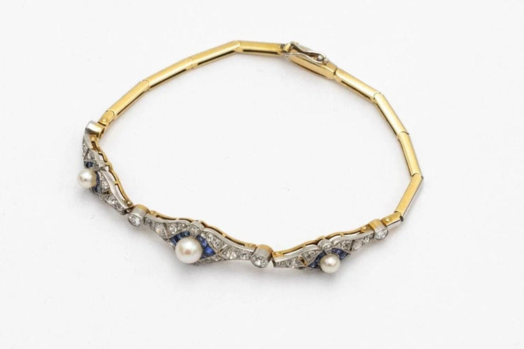 Bracelet Art déco - Bracelet en or jaune, platine, diamants, perles et saphirs synthétiques 58 Facettes 9530