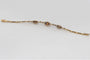 Bracelet Art déco - Bracelet en or jaune, platine, diamants, perles et saphirs synthétiques 58 Facettes 9530