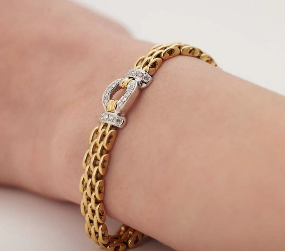 Bracelet Wempe - Bracelet en or jaune et blanc 18K et diamants 58 Facettes