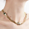 Collier Collier en or jaune 750/1000, diamants, rubis et émeraude 58 Facettes