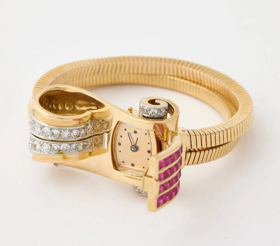 Montre Montre bracelet 1950 en or jaune et platine, diamants 58 Facettes
