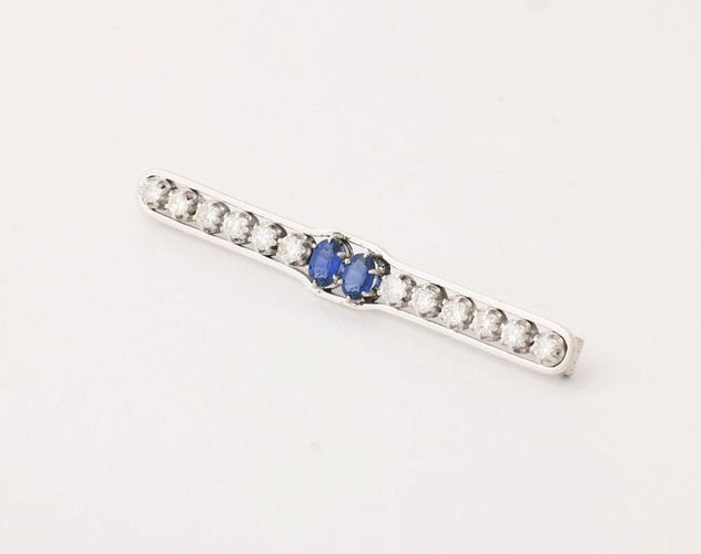 Broche Broche saphirs et diamants en or blanc 18 carats 58 Facettes