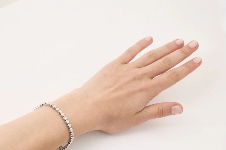 Bracelet Bracelet tennis en or blanc 750 et diamants 3,40 ct 58 Facettes
