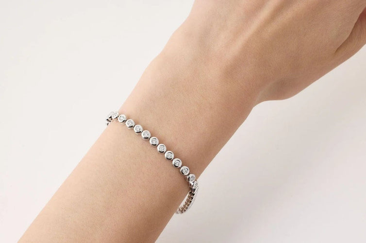 Bracelet Bracelet tennis en or blanc 750 et diamants 3,40 ct 58 Facettes