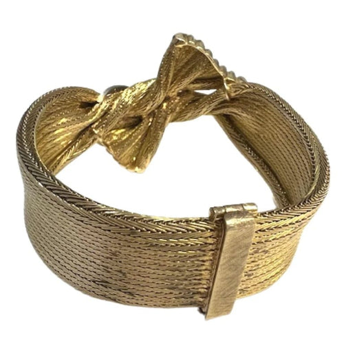 Bracelet Bracelet rétro années 1950 en or 18 carats et diamant 0,26 ct 58 Facettes A2627