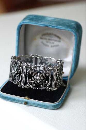 Bracelet Jules Wiese - Bracelet articulé en argent et or jaune 58 Facettes