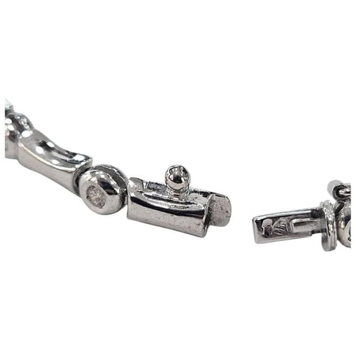 Bracelet Bracelet design contemporain en or 18 carats avec diamants 58 Facettes Q263B(99)
