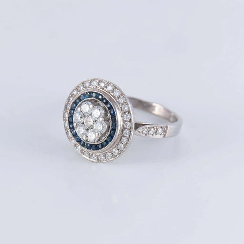 Bague 57 Bague style Art déco en or blanc 18 ct, diamants et saphirs 58 Facettes AB140