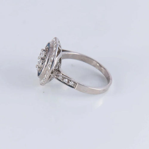 Bague 57 Bague style Art déco en or blanc 18 ct, diamants et saphirs 58 Facettes AB140