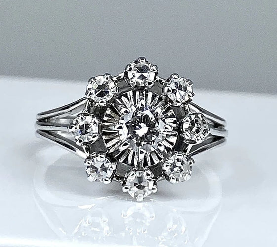 Bague 47 Bague marguerite en or blanc 18 carats et diamants 58 Facettes AB158