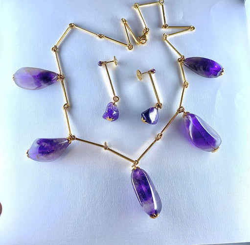 Boucles d'oreilles Parure - Collier et boucles d’oreilles en or 18 carats, améthystes 58 Facettes AB173