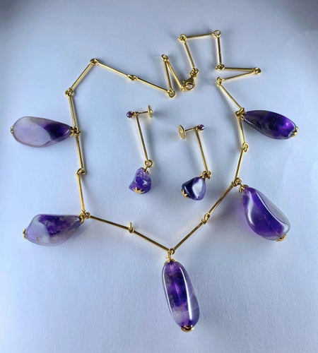 Boucles d'oreilles Parure - Collier et boucles d’oreilles en or 18 carats, améthystes 58 Facettes AB173