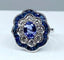 Bague 51 Bague marguerite en or blanc 18 carats, saphirs et diamants 58 Facettes AB214