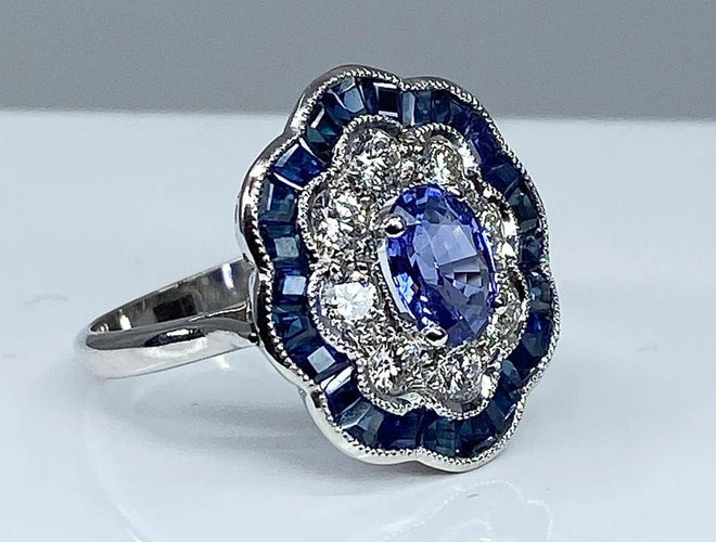 Bague 51 Bague marguerite en or blanc 18 carats, saphirs et diamants 58 Facettes AB214