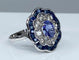 Bague 51 Bague marguerite en or blanc 18 carats, saphirs et diamants 58 Facettes AB214