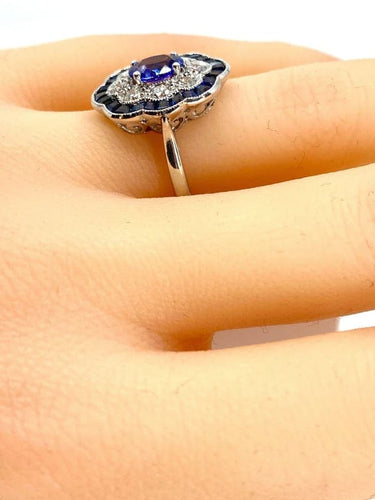 Bague 51 Bague marguerite en or blanc 18 carats, saphirs et diamants 58 Facettes AB214