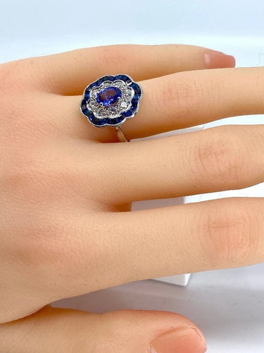 Bague 51 Bague marguerite en or blanc 18 carats, saphirs et diamants 58 Facettes AB214
