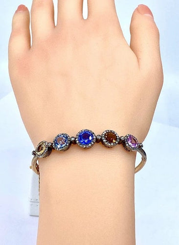 Bracelet Bracelet jonc ouvrant Napoléon III en or 18 carats, diamants et pierres 58 Facettes AB272