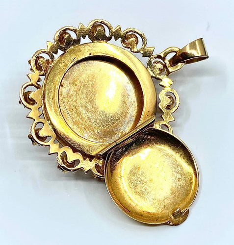 Pendentif Pendentif porte-photo en or 18 carats, perle et pierres rouges 58 Facettes AB307