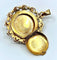 Pendentif Pendentif porte-photo en or 18 carats, perle et pierres rouges 58 Facettes AB307