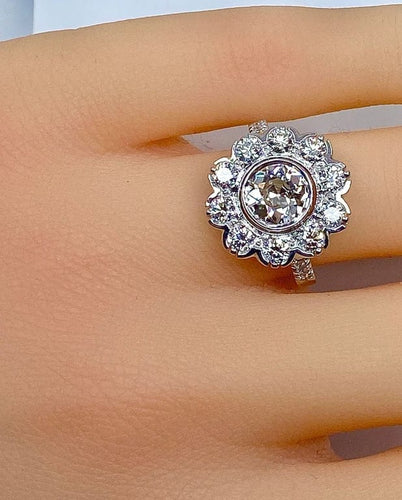 Bague 52 Bague marguerite en or blanc 18 carats avec diamants 58 Facettes AB333