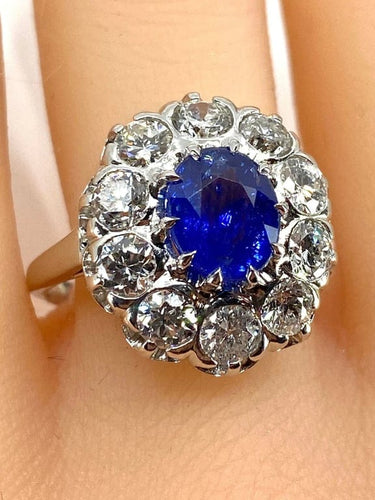 Bague 57 Bague marguerite en or blanc 18 carats et platine, saphir et diamants 58 Facettes AB347