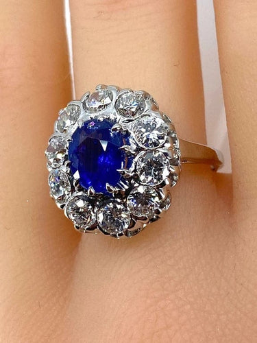 Bague 57 Bague marguerite en or blanc 18 carats et platine, saphir et diamants 58 Facettes AB347