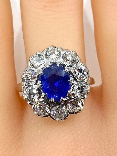 Bague 57 Bague marguerite en or blanc 18 carats et platine, saphir et diamants 58 Facettes AB347