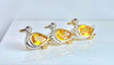 Broche Broche canards en or jaune 18 carats, saphirs jaunes, diamants et rubis 58 Facettes AB455