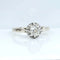 Bague 50.5 Bague solitaire en or blanc 18 carats et platine sertie d’un diamant 0,50 ct 58 Facettes AB536