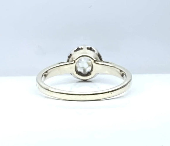 Bague 50.5 Bague solitaire en or blanc 18 carats et platine sertie d’un diamant 0,50 ct 58 Facettes AB536