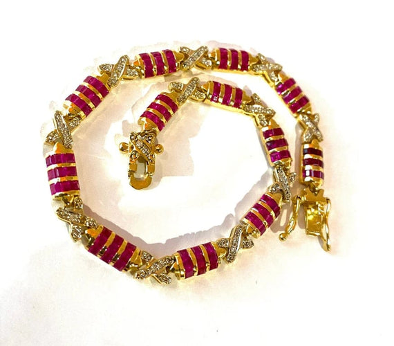 Bracelet Bracelet en or jaune 18 carats avec rubis calibrés et diamants 58 Facettes AB620