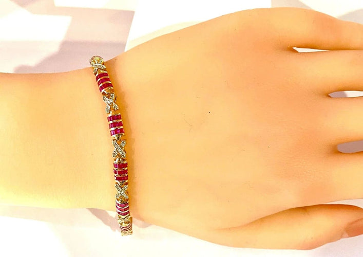 Bracelet Bracelet en or jaune 18 carats avec rubis calibrés et diamants 58 Facettes AB620