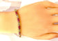 Bracelet Bracelet en or jaune 18 carats avec rubis calibrés et diamants 58 Facettes AB620
