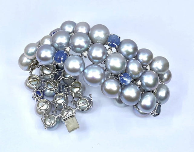 Bracelet Bracelet en or blanc 18 carats, saphirs étoilés, diamants et perles grises 58 Facettes AB632