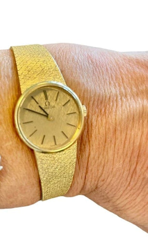 Montre Omega - Montre vintage en or jaune 750 58 Facettes