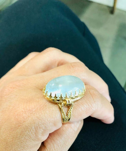 Bague 60 Bague ancienne en or jaune 18k avec aigue-marine cabochon 58 Facettes
