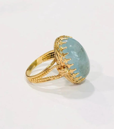 Bague 60 Bague ancienne en or jaune 18k avec aigue-marine cabochon 58 Facettes