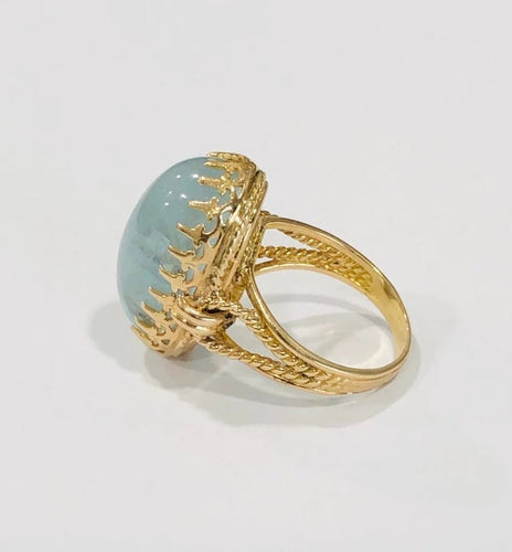 Bague 60 Bague ancienne en or jaune 18k avec aigue-marine cabochon 58 Facettes