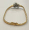 Bracelet Bracelet ancien en or jaune 18k avec émeraudes et diamants 58 Facettes