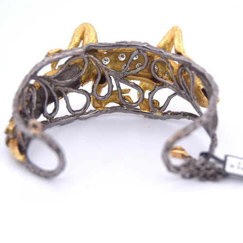 Bracelet Bracelet rigide motif gecko en or 18 carats, diamants et saphirs 58 Facettes BR113
