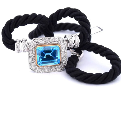 Pendentif Pendentif années 80 en or jaune 18 carats, topaze bleue et diamants 58 Facettes