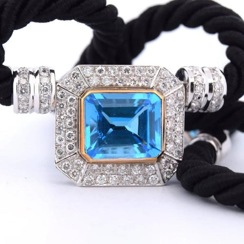 Pendentif Pendentif années 80 en or jaune 18 carats, topaze bleue et diamants 58 Facettes
