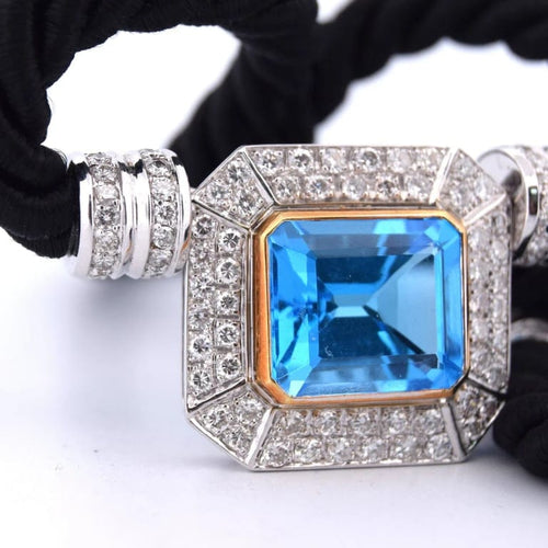 Pendentif Pendentif années 80 en or jaune 18 carats, topaze bleue et diamants 58 Facettes