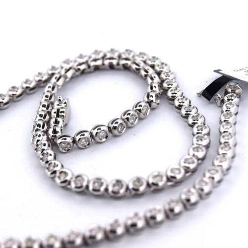 Collier Collier tennis en or blanc 18 carats et diamants 58 Facettes