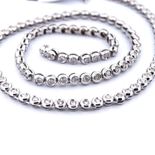 Collier Collier tennis en or blanc 18 carats et diamants 58 Facettes