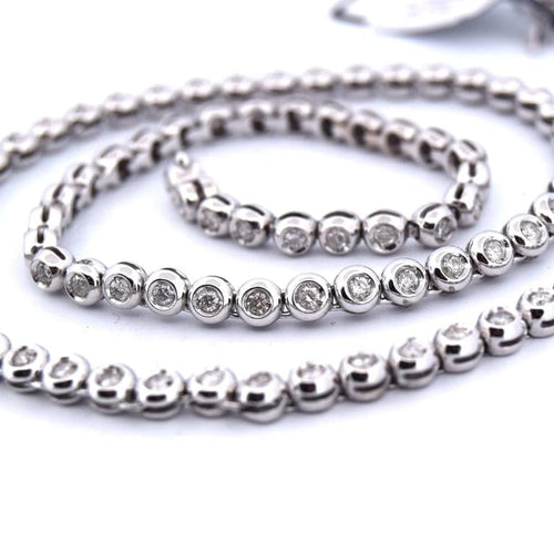 Collier Collier tennis en or blanc 18 carats et diamants 58 Facettes
