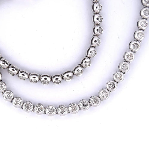 Collier Collier tennis en or blanc 18 carats et diamants 58 Facettes