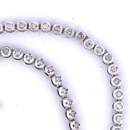 Collier Collier tennis en or blanc 18 carats et diamants 58 Facettes